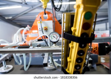 Suction cups equipment for transporting large sheets of metal - Shutterstock ID 1818338306