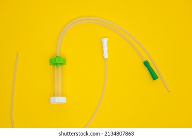 Suction Tube, Surgical Equipment On A Yellow Background