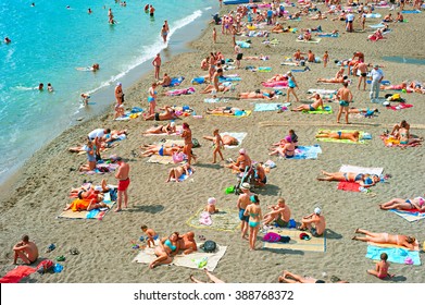 SUDAK, UKRAINE - SEPT 08, 2015: People At A Sea Beach In Sudak. According To National Geographic, Crimea Was Among The Top 20 Travel Destinations In 2013