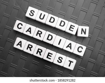 Sudden Cardiac Arrest, word cube with background.