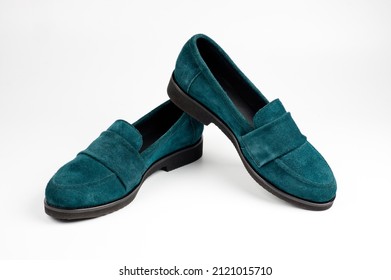 Suede Dark Green Women's Slip-on Shoes With A Small Heel. Close-up Shot.