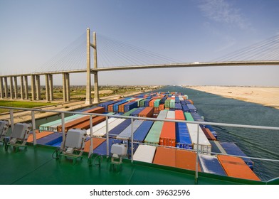 Suez Canal Bridge And A Large Container Vessel