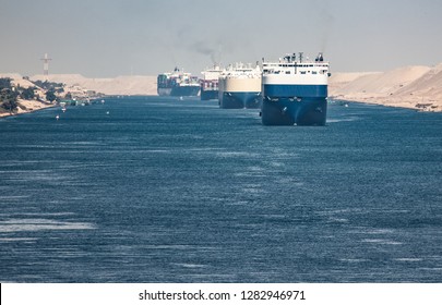 The Suez Canal is a shipping canal in Egypt.A cargo ship drives the Suez Canal.
