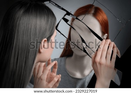 Suffering from hallucinations. Woman seeing her faceless reflection in broken mirror Stock foto © 