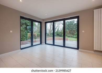 Suffolk, England - December 16 2016: Unfurnished Modern Interior With Corner Bifold Patio Folding Doors.