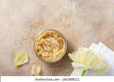 Sugar Body Scrub In Glass Jar On Stone Table. Homemade Cosmetic For Spa.