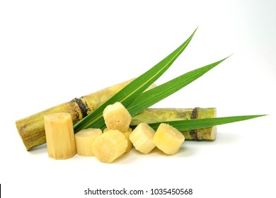 sugar cane and brown sugar on white isolate background - Shutterstock ID 1035450568