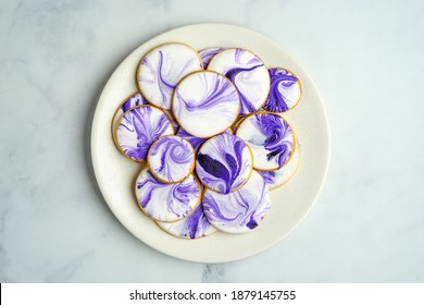 Sugar Cookies With Marbled Purple Royal Icing