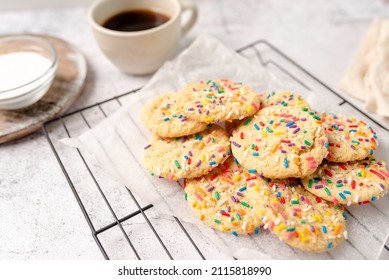 Sugar cookies with sprinkles, colorful coffee treat. freshly baked dessert cookies. - Powered by Shutterstock