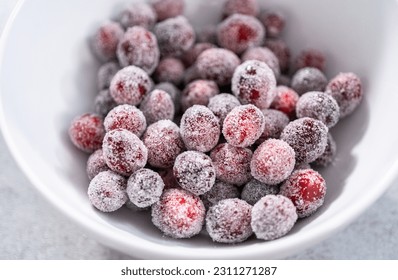 Sugar cranberries. Organic cranberries covered with white sugar.