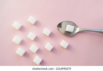 Sugar Cubes, Spoon On Pink Background