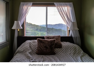 Sugar Mountain, North Carolina View From Window Of Blue Ridge Mountains At Sunset From Bedroom Room Of House Home Or Apartment With Curtains And Bed