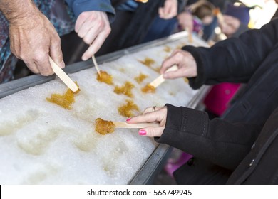 Sugar On Snow, Or Maple Taffy At The Sugar Shack In Quebec, Canada