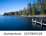 Sugar Pine Beach Park in South Lake Tahoe, California with Piers, Blue Lake, Sand, Water, Greenery and room for text.