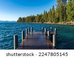 Sugar Pine Beach Park in South Lake Tahoe, California with Piers, Blue Lake, Sand, Water, Greenery and room for text.