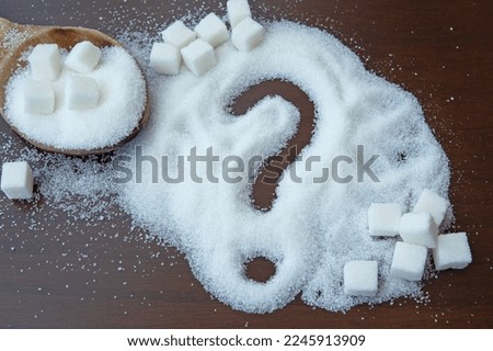 sugar and question mark.concept of thinking while consuming sugar.
