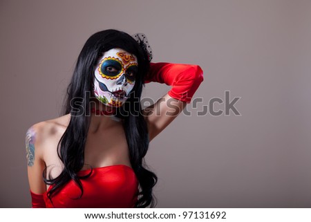 Sugar skull girl in red dress, copy-space for your text