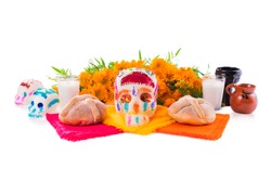 Sugar Skull Used For "dia De Los Muertos" Celebration Isolated On White With Cempasuchil Flowers