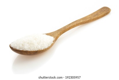 Sugar And Spoon Isolated On White Background