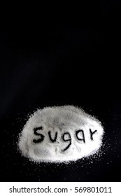 Sugar spread and written text on black background
