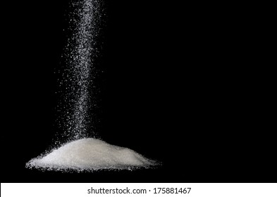 Sugar Sprinkle On A Pile With Black Background