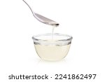 Sugar syrup in glass bowl isolated on white background 