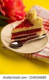 Sugar Temptation With A Delicious Red Velvet Cake Served On A Plate With A Teaspoon Near