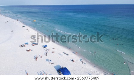 Sugar white sandy beach Gulf shores with crowded of people swimming, relaxing in colorful tents, beach canopy, lounge chair, turquoise water, South Walton beach, Destin, Florida. Travel destination Stock photo © 