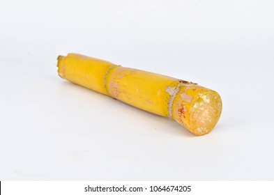 Sugarcane on white background. Selective focus.