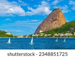 Sugarloaf sugar loaf mountain Pão de Açucar panorama view and cityscape of the Urca village in Rio de Janeiro Brazil.