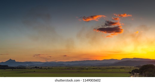 Sugercane Smoke At Sunset Overlooking Mount Warning, NSW, Australia