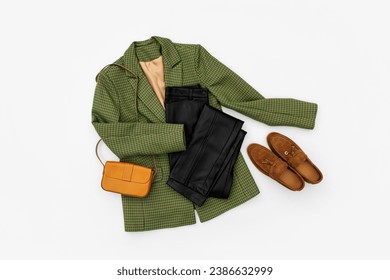 Suit jacket  blazer with pants and loafers on white background. Women's stylish autumn or winter clothes. Fashion classic outfit. Cozy winter fall look. Trendy clothes collage. Flat lay, top view. - Powered by Shutterstock