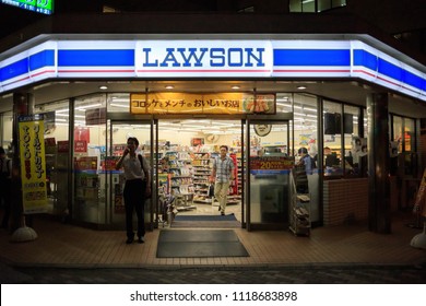 Suita, Japan - June 22, 2018: Customers In Front Of Lawson Convenience Store At Night