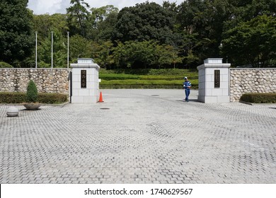 Suita, Osaka / Japan - September 18 2015: Security Guard At The Entrance Of Senriyama Campus Of Kansai University In Suita, Osaka, Japan.