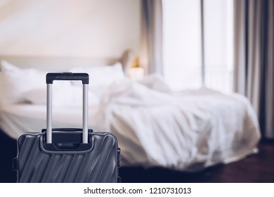 Suitcase Or Luggage Bag In A Modern Hotel Room Prior To Checkin Or Checkout