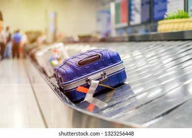 Suitcase Or Luggage With Conveyor Belt In The Airport