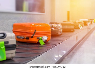 Suitcase Or Luggage With Conveyor Belt In The Airport.