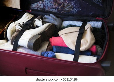 Suitcase Packed Up For Winter Travel