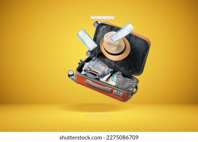 	
suitcase with yellow background and empty space for text shades of yellow background - Shutterstock ID 2275086709