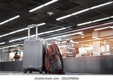 Suitcases on airport waiting departure lounge traveler, Suitcase bag luggage passenger on terminal floor. Time Summer travel when coronavirus pandemic COVID19 disease that no many tourist for flight