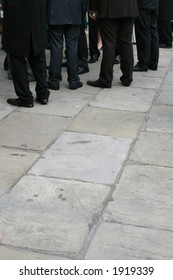 Suited Men At A Meeting