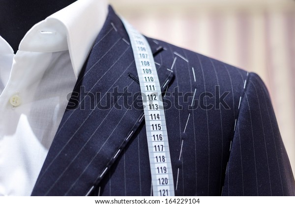 Suits on shop\
mannequins
