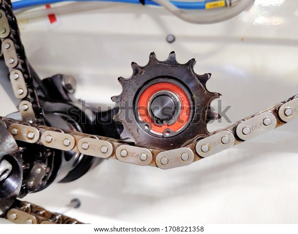 Sukabumi-Indonesia,
April 2020. Gearset and chain as a driving force in a production
machine, in a factory making
sachets