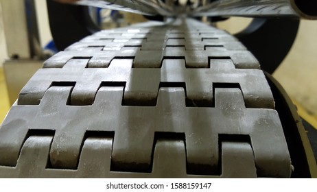 Sukabumi-Indonesia, December 2018. Teflon Chain Conveyor, On An Inline Machine.  At The Factory