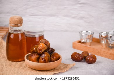 sukkari dates or kurma sukari for feast day ied mubarak with honey in the jar whitespace