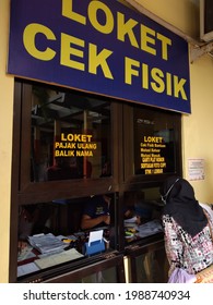 Sukoharjo, Indonesia - May 27, 2021: Vehicle Physical Inspection Counter To Complete The Vehicle Tax Payment Process At The Samsat Office. Government Public Services.