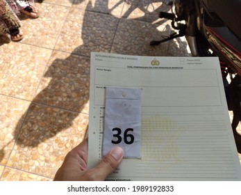 Sukoharjo, Indonesia - May 27, 2021: Someone Is Waiting For The Results Of A Physical Vehicle Check To Complete The Vehicle Tax Payment Process At The Samsat Office. Government Public Services.