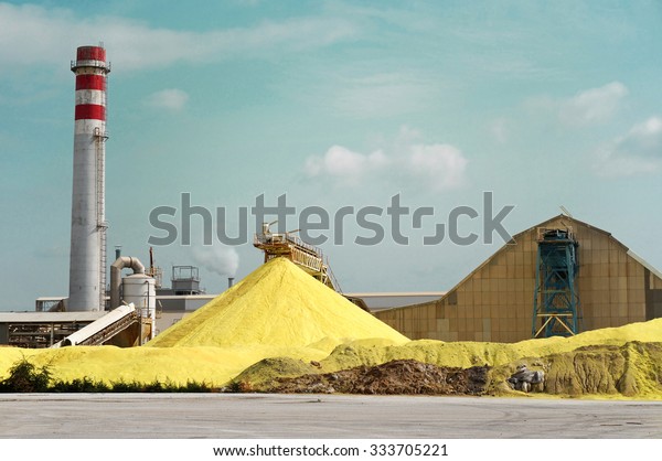Sulfur Factory / A Yellow Pile of Sulfur\
Produced in an Industrial\
Facility