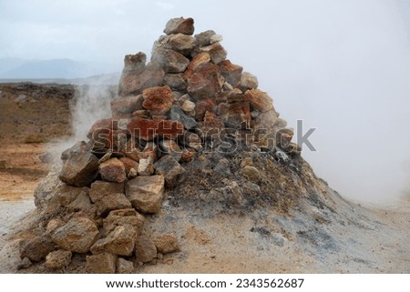 Sulfuric smoker and colorful geothermal structures at Hverir area, Iceland