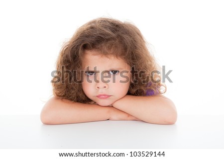 sulky angry young girl child, sulking and pouting,